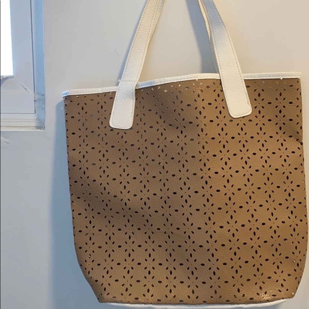 Perforated faux leather bag from sala fifth ave